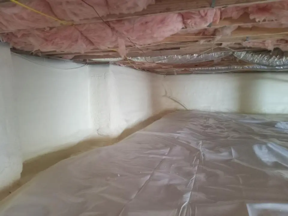 Crawl space encapsulation with closed-cell spray foam for Storm Damage Roof Repair in Clark